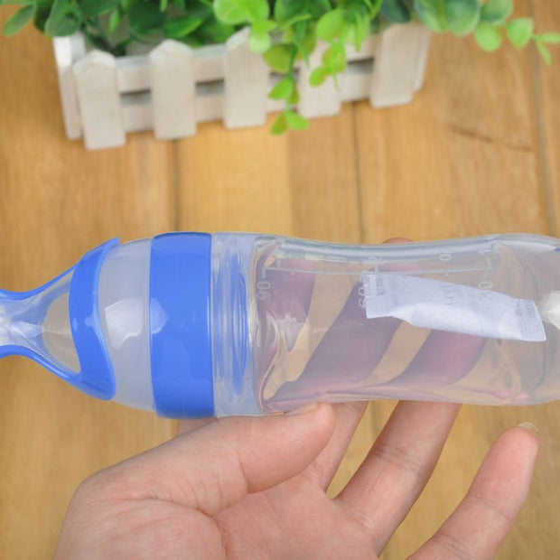 Baby Squeezing Feeding Bottle