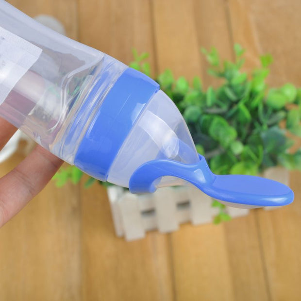 Baby Squeezing Feeding Bottle